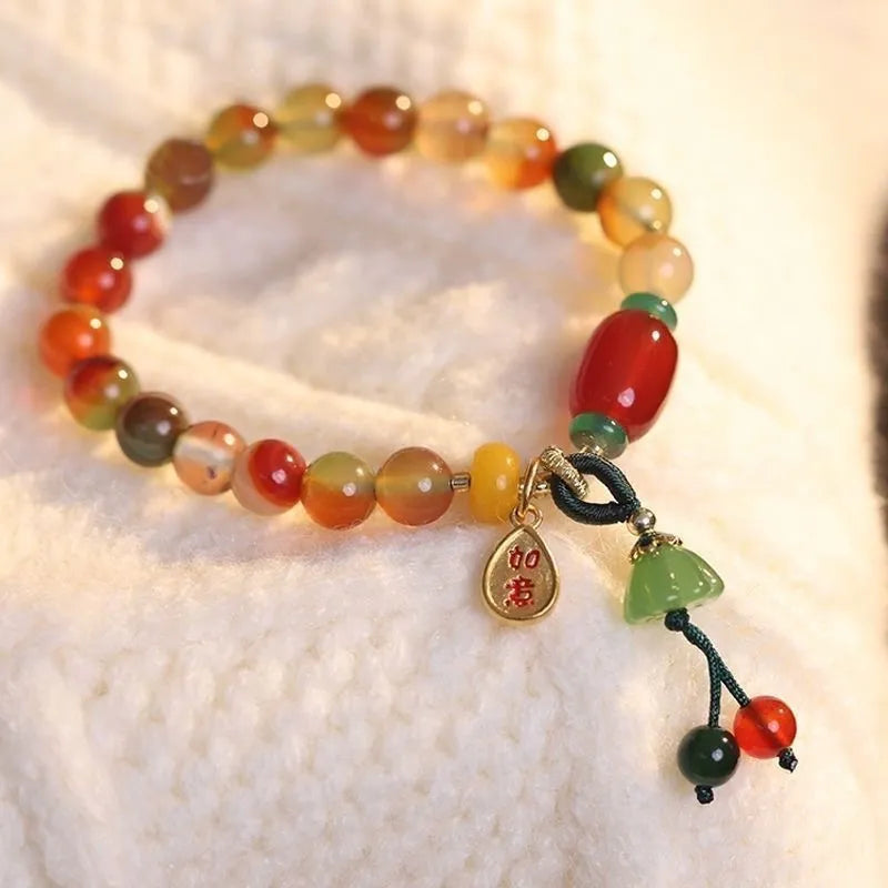 M990 Lotus Ruyi bracelet showing mixed material construction and lotus decorative element