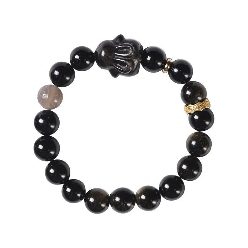 Handmade obsidian bracelet with lying rabbit charm, grey agate accents, and Yaoshi metallic elements in traditional national style