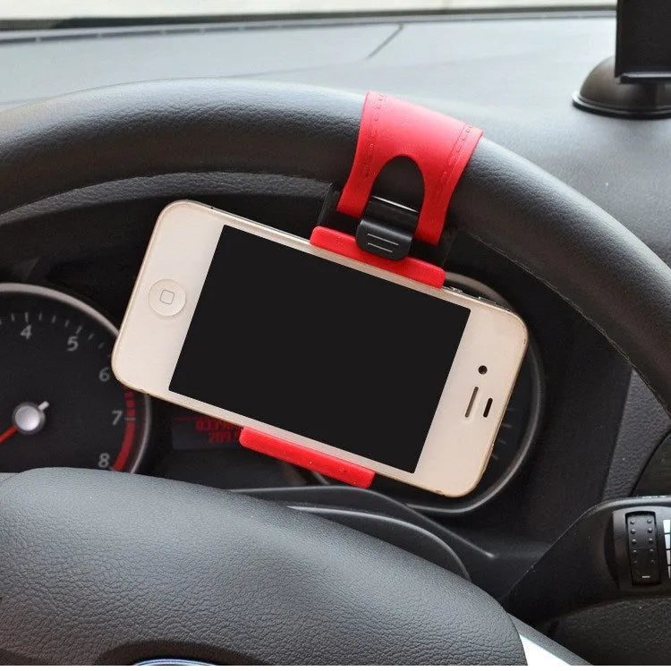 Black universal steering wheel phone mount clip holding a smartphone for hands-free use while driving.