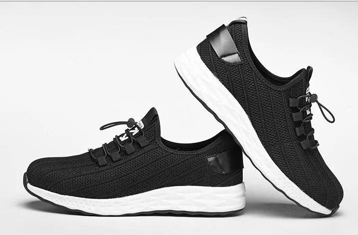 Black low-cut safety shoes with steel toe cap, flying net upper, ventilation holes, anti-skid sole, sizes 36-46.