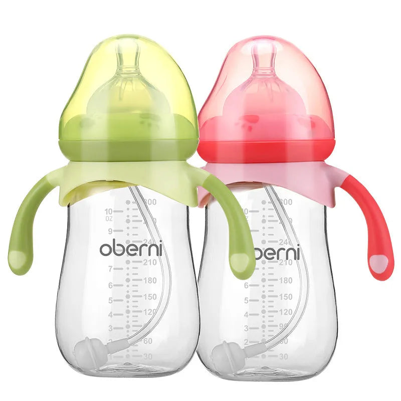 Wide neck anti-colic baby bottle with detachable handles in blue, green, and red colours