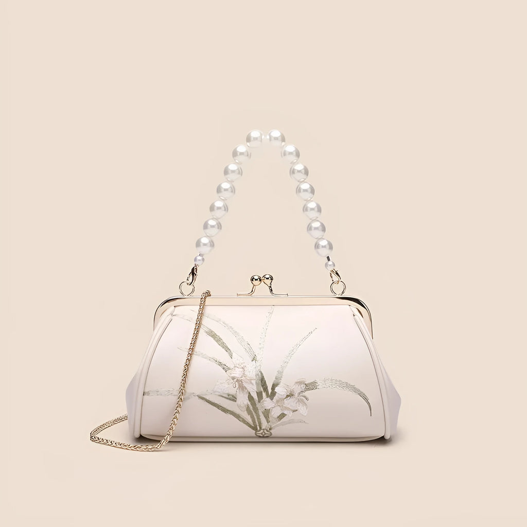Beige women's shoulder bag with embroidery on soft PU leather in shell shape