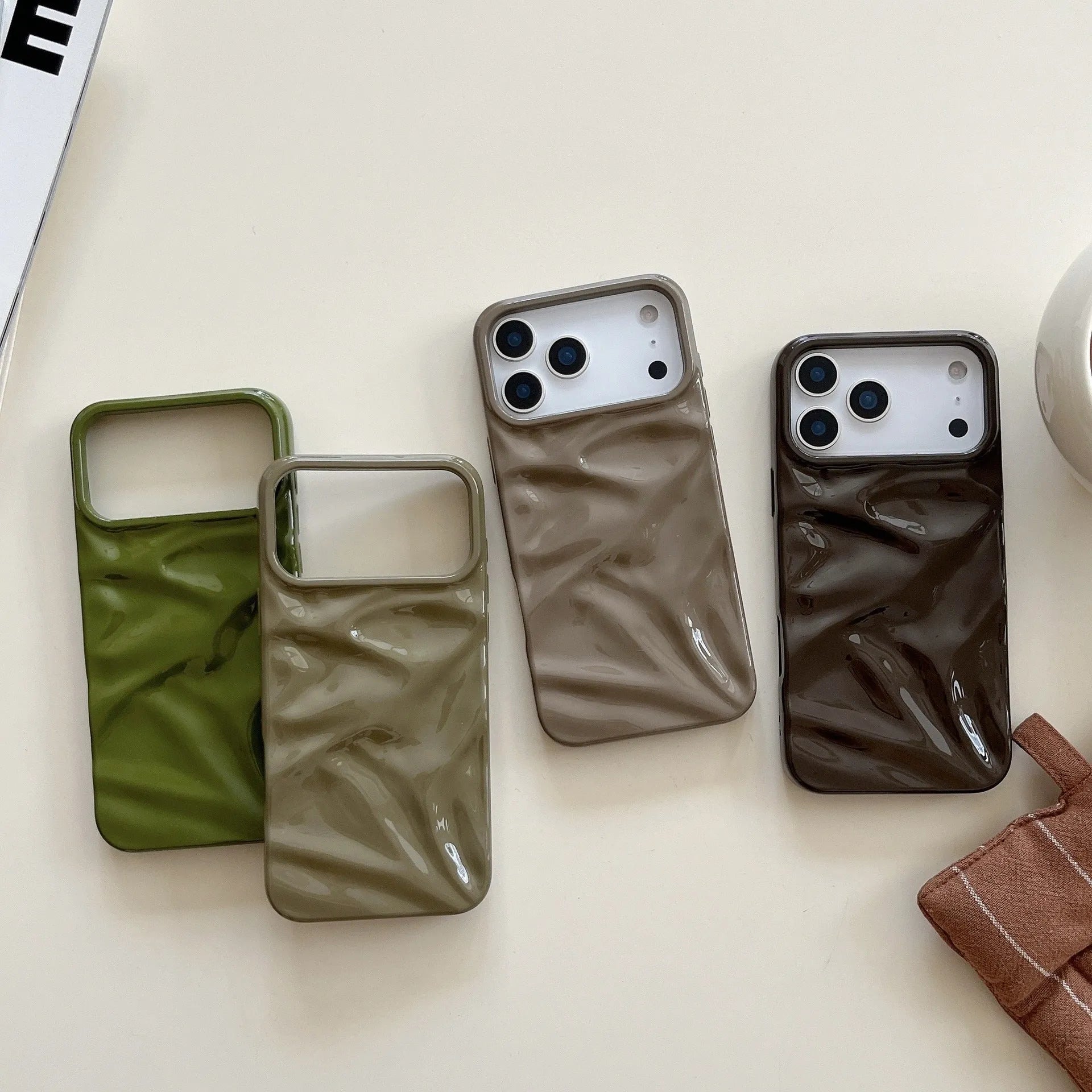 QF pleated TPU phone case in green for iPhone 15 Pro with three-dimensional textured pattern
