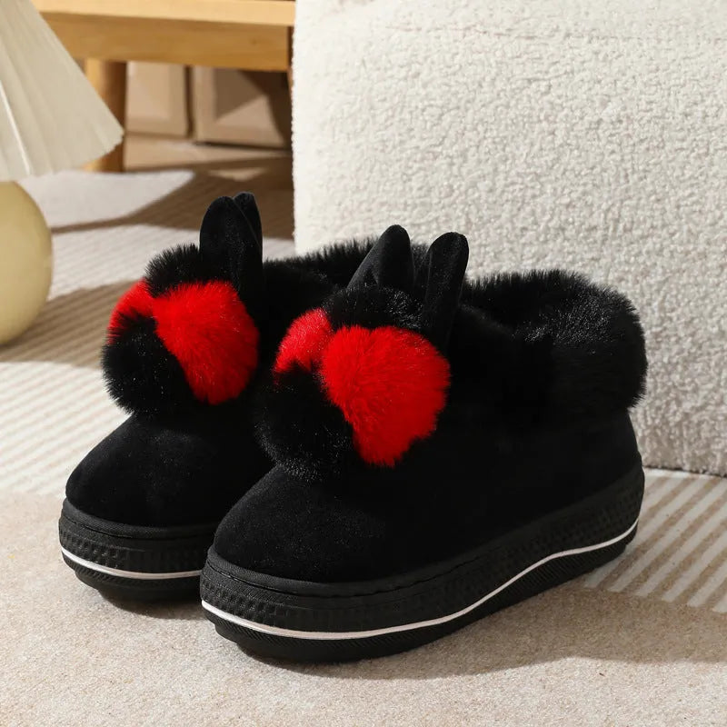 Women's black high heel slippers with thick sole and plush cotton upper, shown as an overshoe.