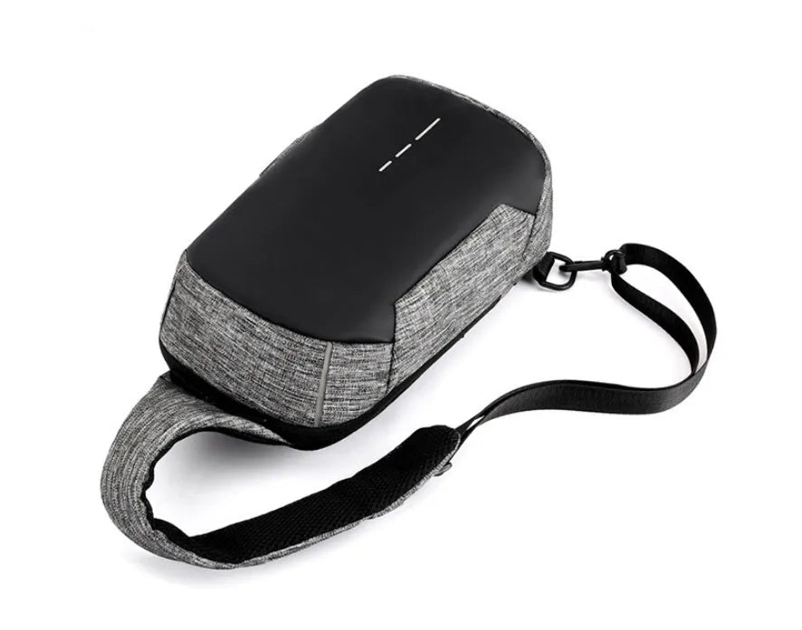 Dark blue waterproof Oxford cloth chest bag with zip and adjustable strap, shown front-on.