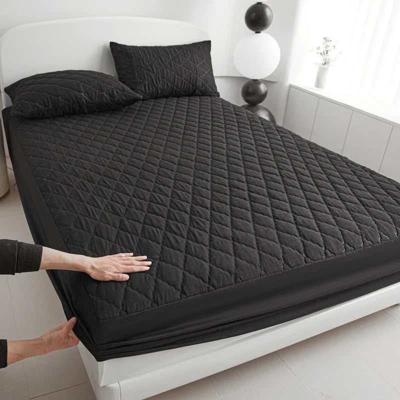 Diamond lattice quilted waterproof mattress protector fitted sheet in bamboo fibre.