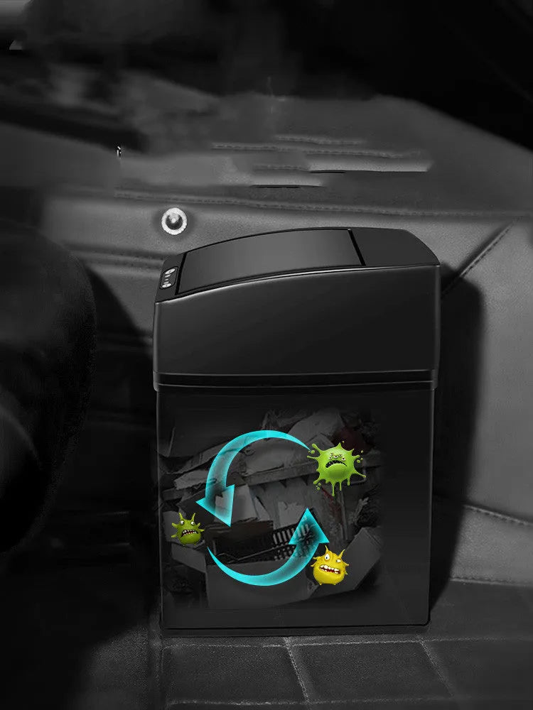 Black intelligent induction trash can with 3-litre capacity for car use on a car floor mat