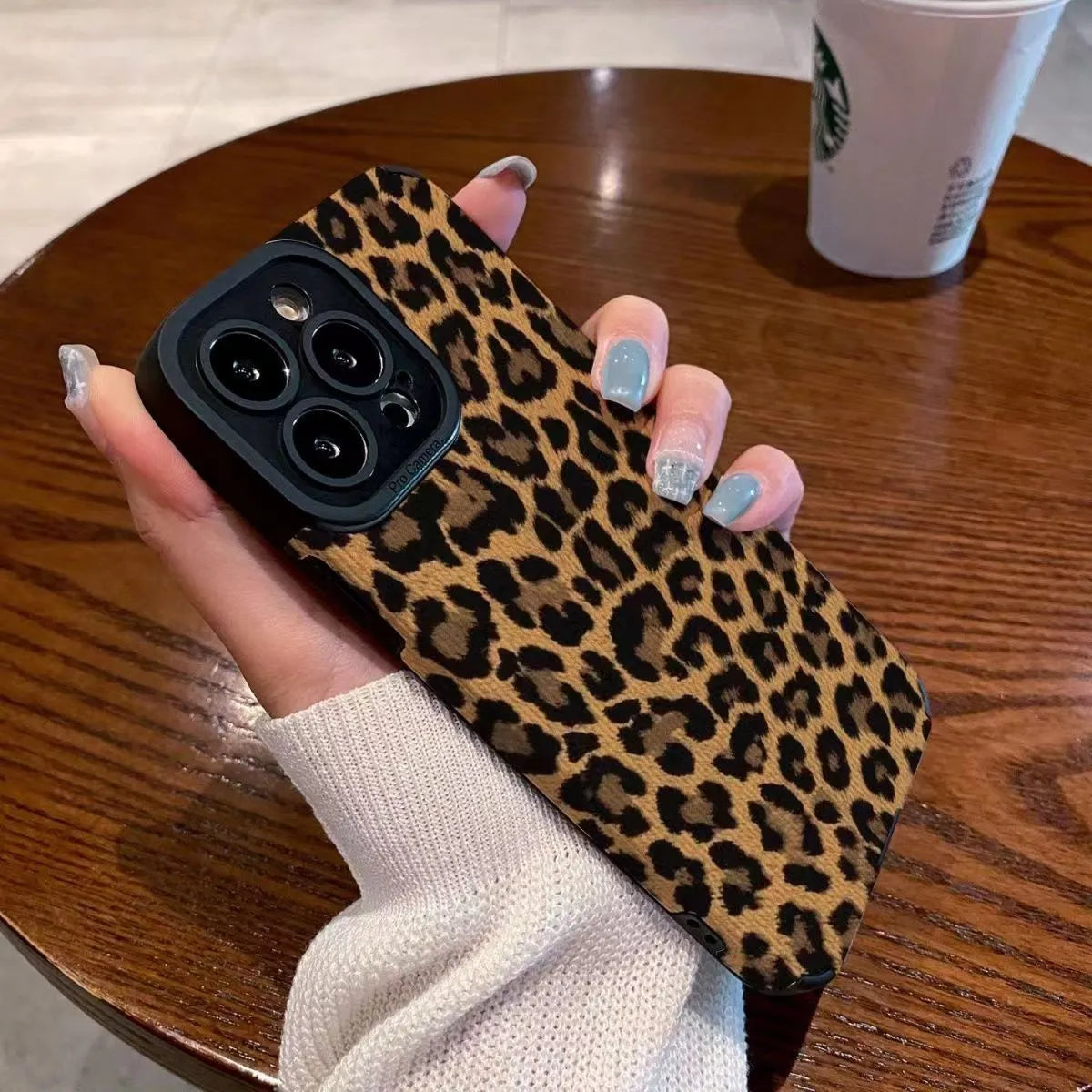 Brown leopard print iPhone 15 phone case with three-dimensional relief and TPU material.