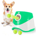 Automatic dog ball launcher in green and yellow for outdoor fetch play
