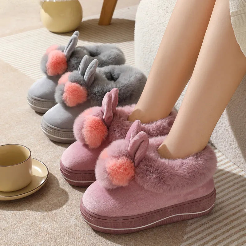 Women's black high heel slippers with thick sole and plush cotton upper, shown as an overshoe.