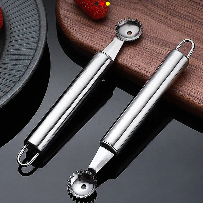 Stainless steel strawberry stem remover, 410 steel, modern minimalist kitchen gadget for hulling strawberries.
