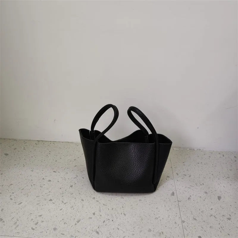 Retro portable casual crossbody women's bag in soft PU, bucket shape, 19cm length, available in seven colours.