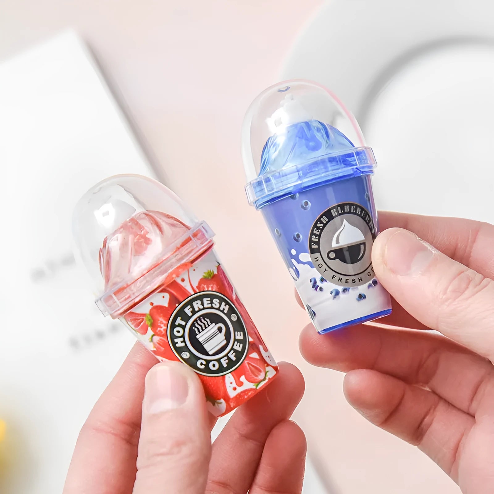 Plastic ice cream shape correction tape with tea cup design in blue shell on white background