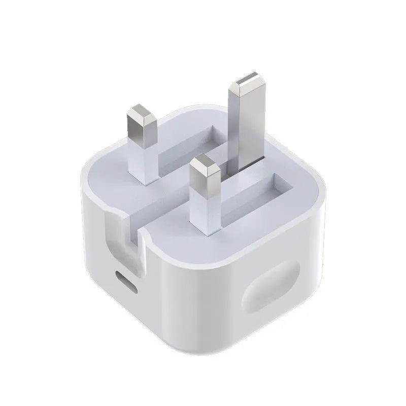 White 20W USB-C Power Delivery fast charger with British plug and coiled USB-C cable.