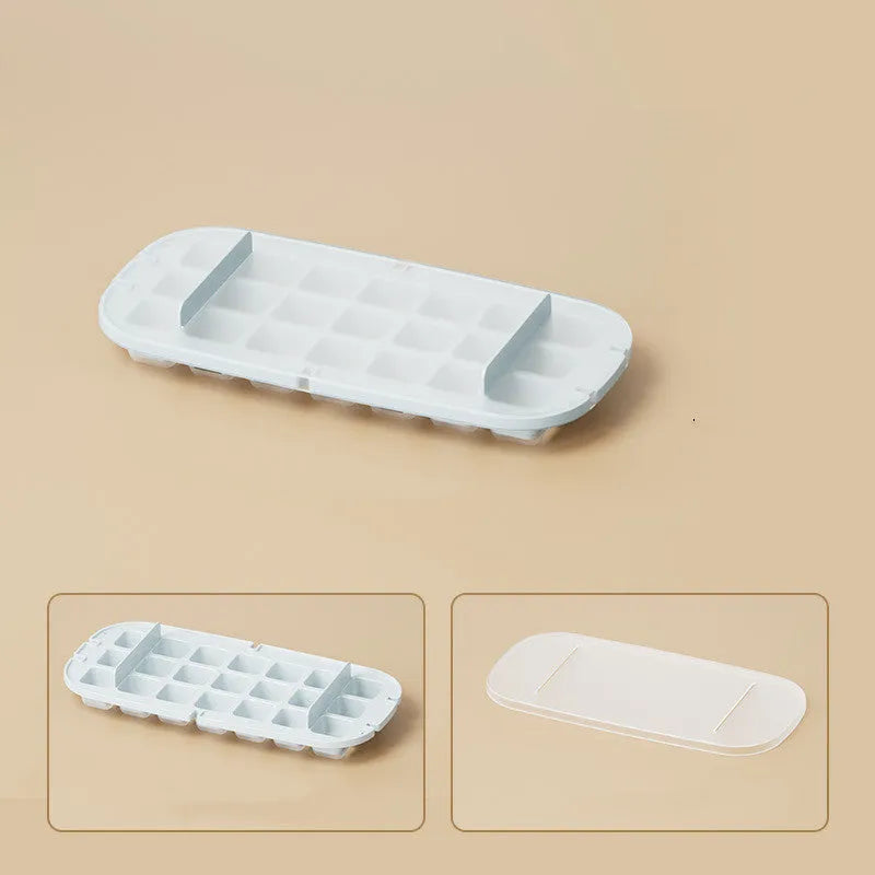 High-capacity food-grade ice cube tray in blue with integrated ice shovel storage.