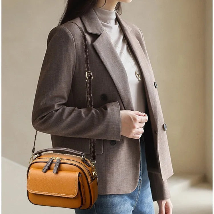 Women's cross-body portable shoulder bag in horizontal square shape with black, green or orange colour options