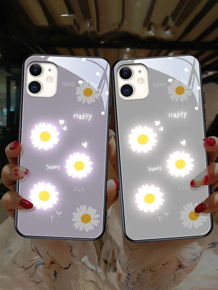 White luminous iPhone case with painted daisy design and voice-activated colour light feature.