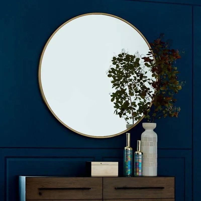 Round iron-framed bathroom wall mirror in black, gold, or white, shown in 30cm and 60cm sizes.