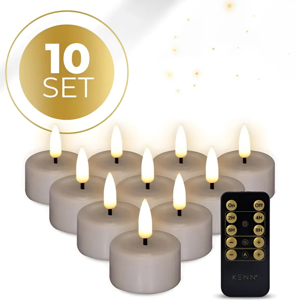 Four taupe-coloured LED tealight candles with a glowing 3D flame effect on a table.