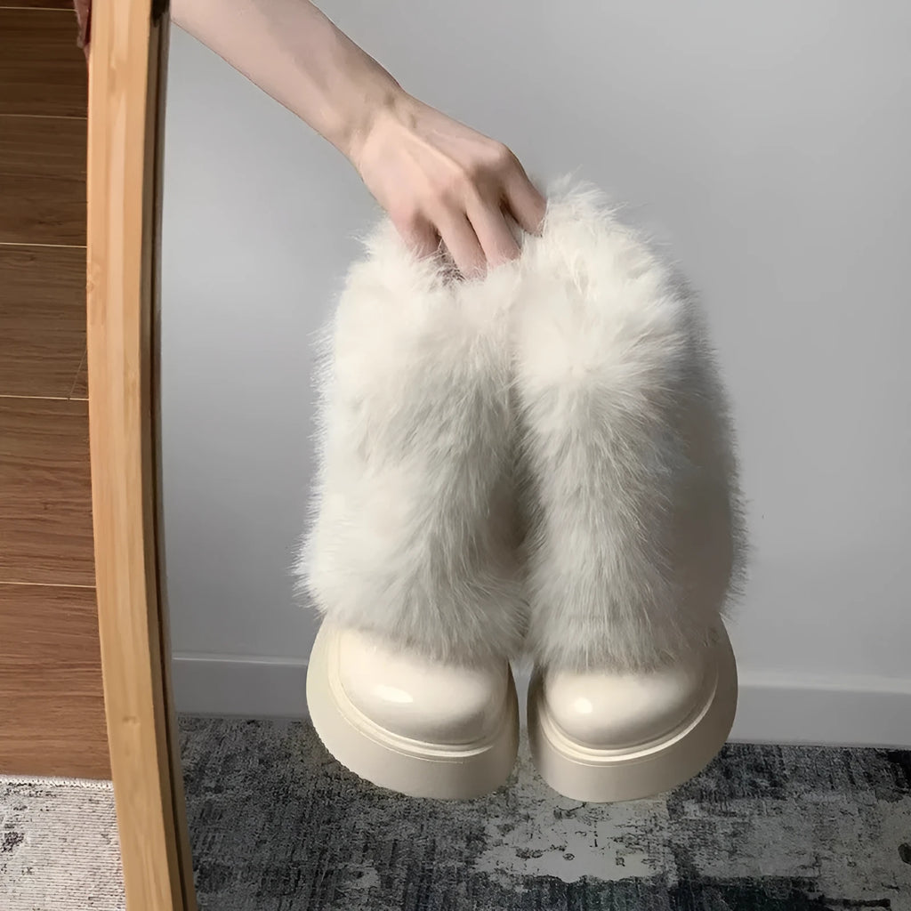 Women's black artificial plush snow boots with a waterproof rubber sole and round toe design.