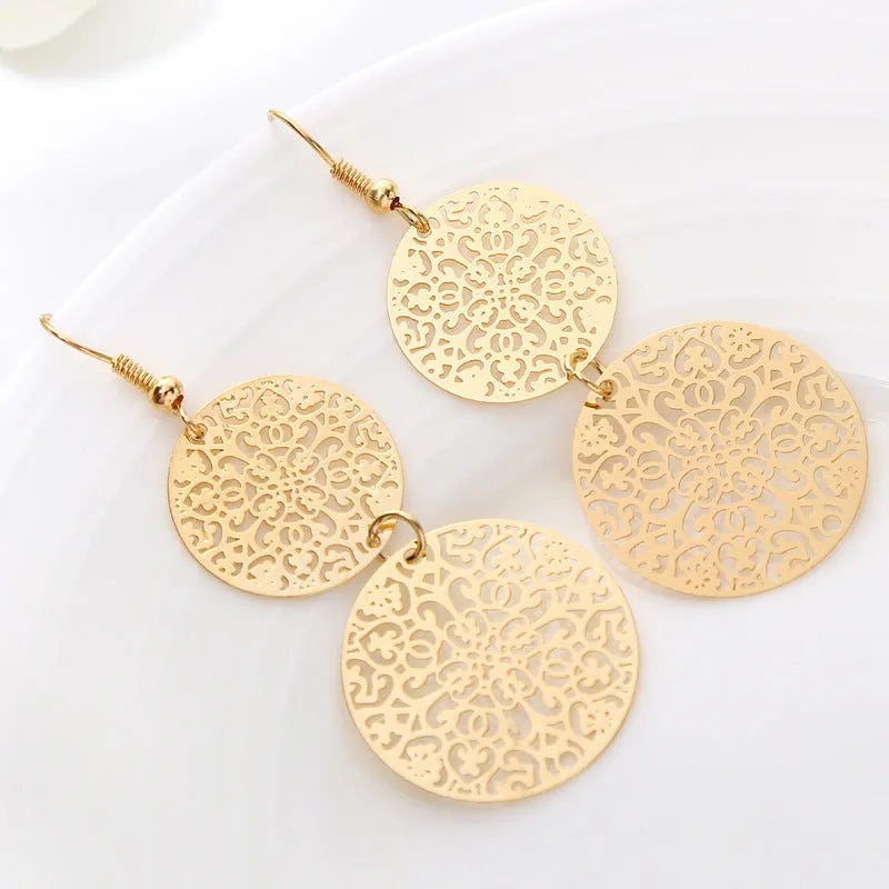 Women's round hollow gold dangle drop earrings in zinc alloy, 4.5 by 8 centimetre size