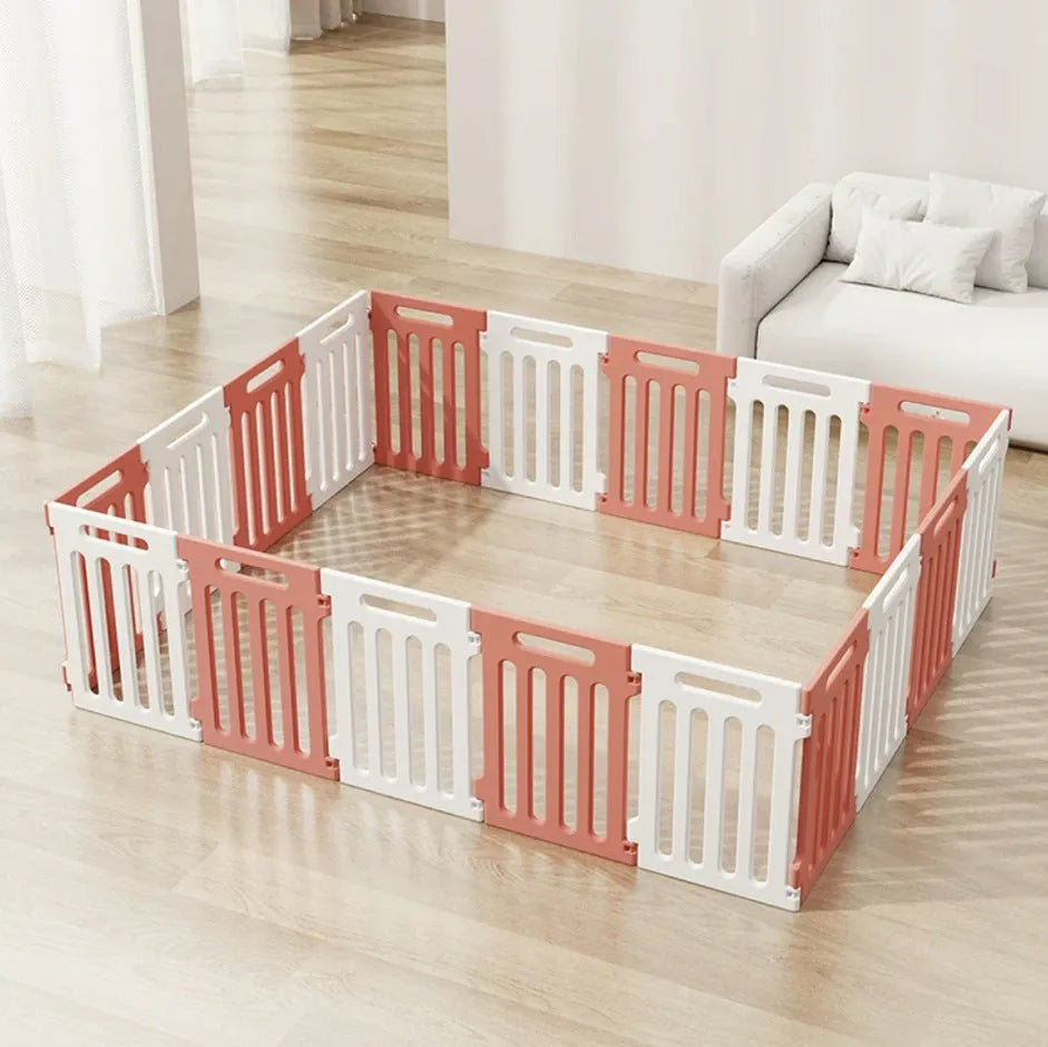 Plastic modular pet isolation fence panels assembled as indoor dog enclosure in white and green colour combination