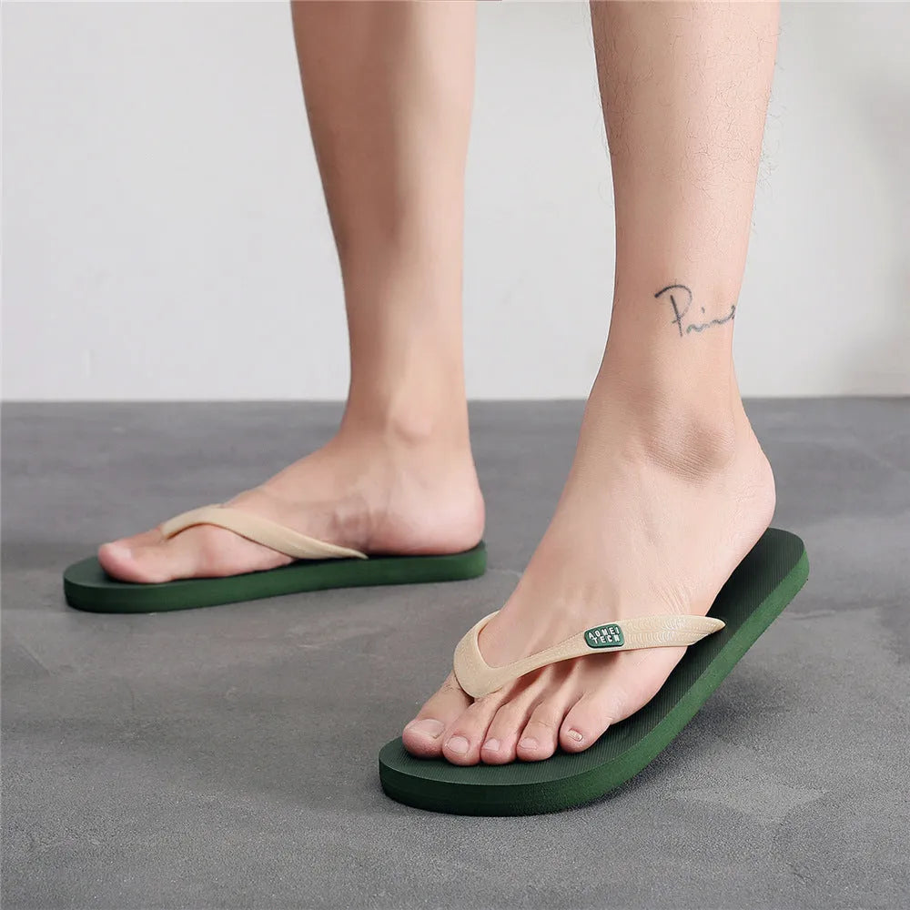 Men's black flip-flop slippers with a textured rubber sole and EVA upper.