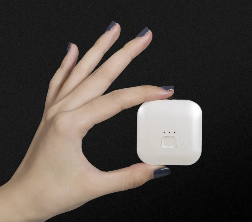 USB mini portable air purifier necklace in blue, grey, pink or white colours with charging cable