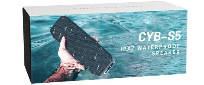 Black waterproof Bluetooth speaker with control buttons and multiple connection ports