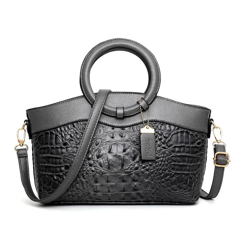 31cm wide fabric ladies handbag in multiple colours, showing zipper compartment and internal organisation slots.