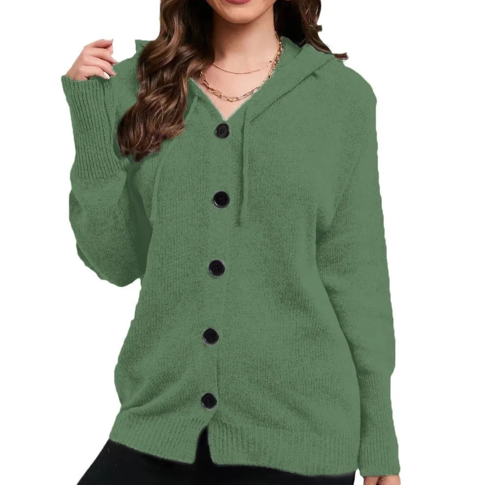 Women's solid colour hooded cardigan in thick cotton fabric showing loose fit and long sleeves