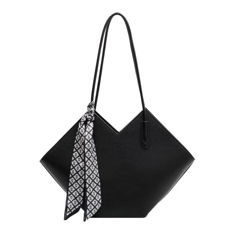 Beige women's large shoulder bag made of PU leather with multiple pockets and an adjustable strap.