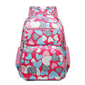 Blue children's large capacity Oxford cloth school backpack with air pillow straps.