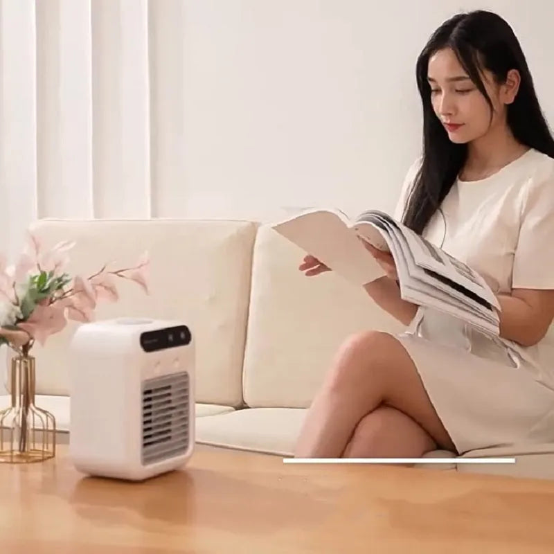 Ivory white portable USB air cooler fan with touchscreen controls and water tank