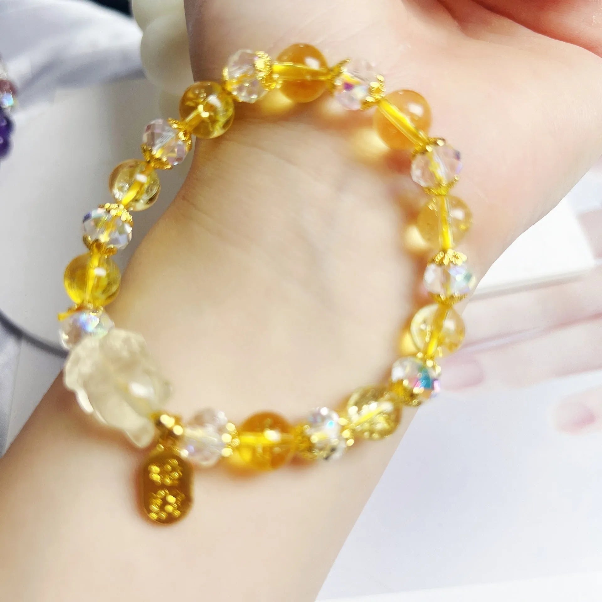 Handmade women's bracelet with citrine crystal stones in nine-tail fox design
