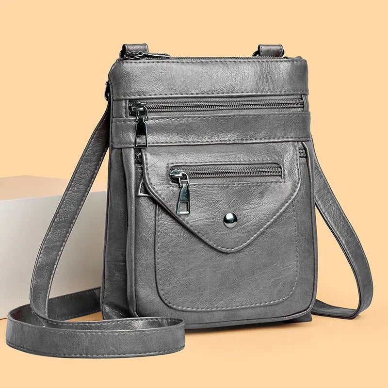 Vertical crossbody phone bag for women in square shape with visible sewing lines