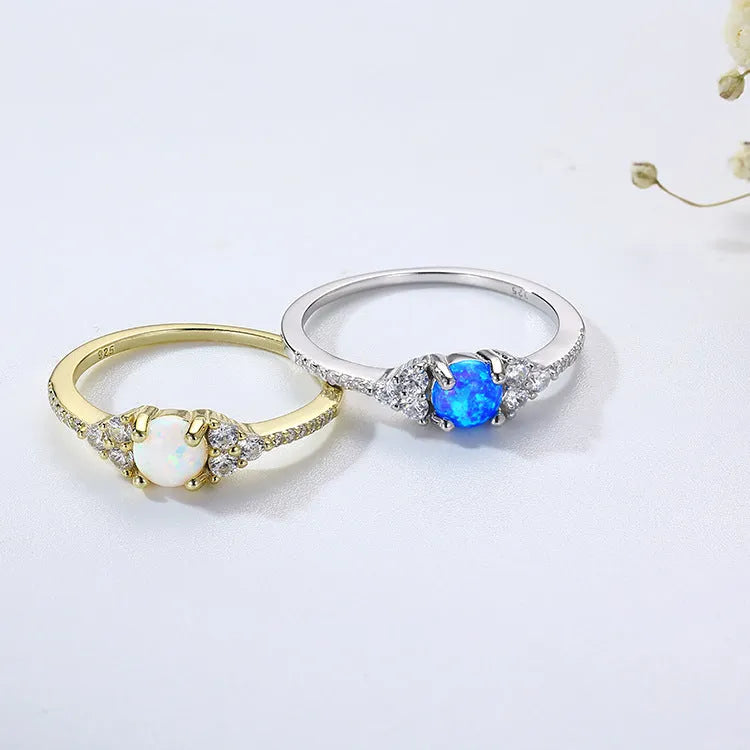 Geometric silver ring with big diamond design, electroplated finish, white or blue opal colour, sizes 5 to 9