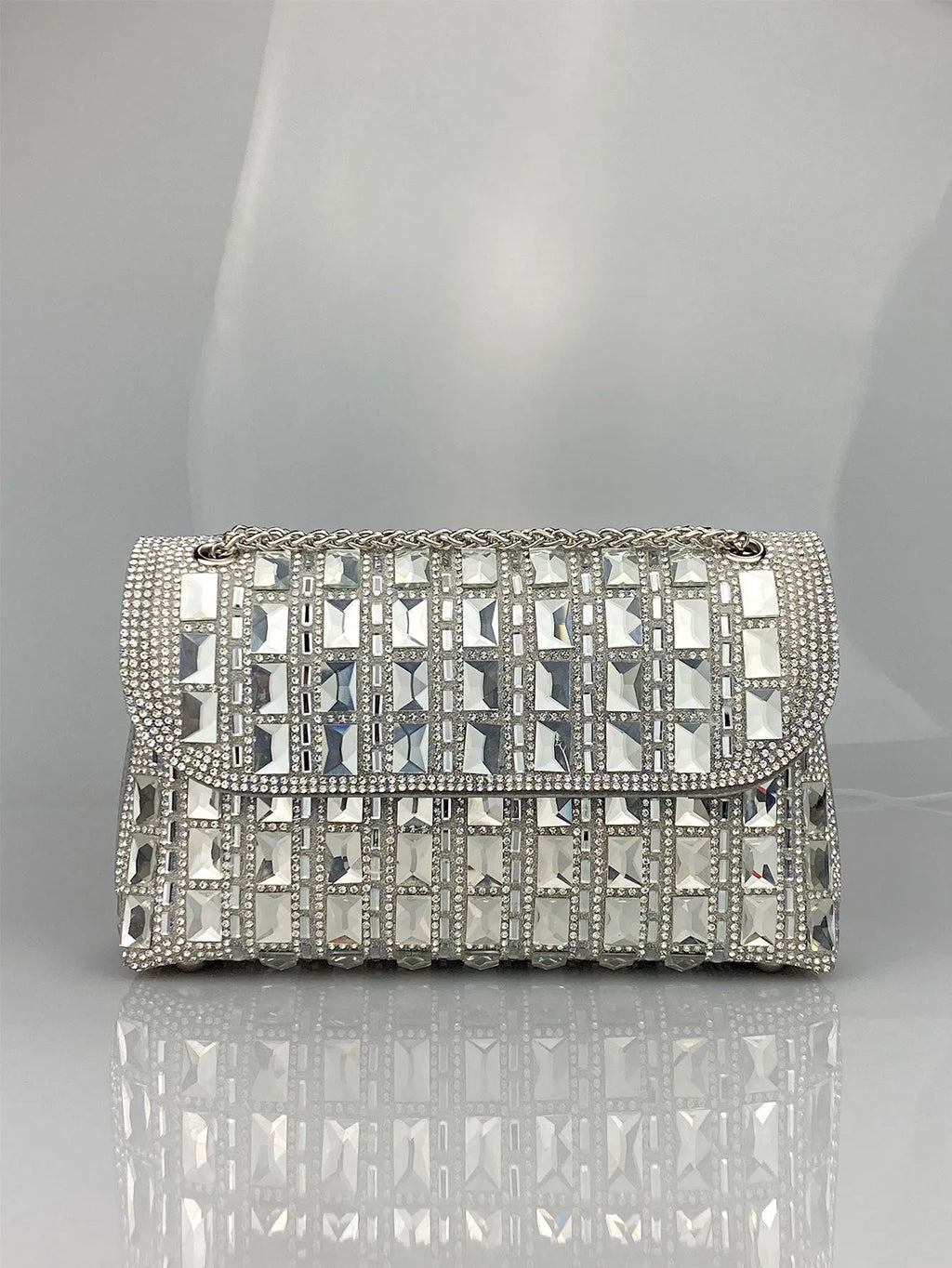 Glass rhinestone chain clutch handbag in horizontal square shape with retro styling and chain strap