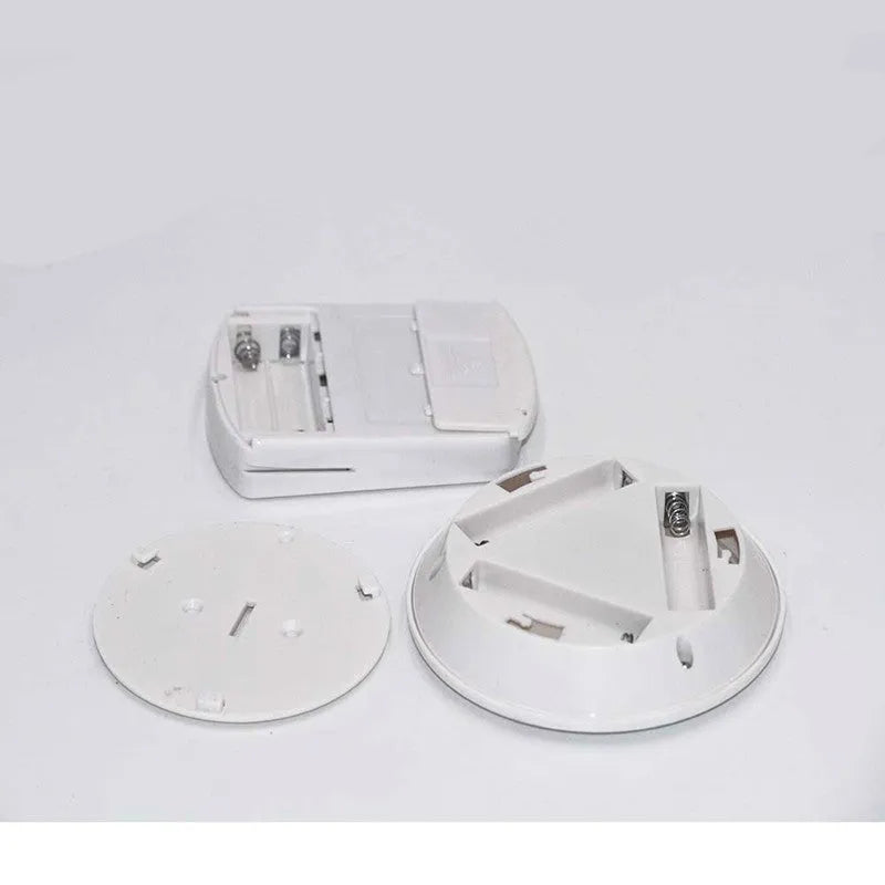 Dimmable LED light box with remote control and battery, shown in cold white or warm white options.