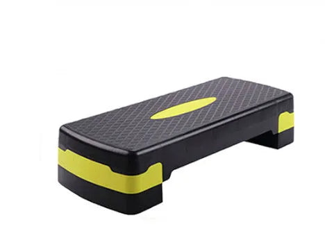Grey Fit Step aerobics platform for fitness training on a floor.