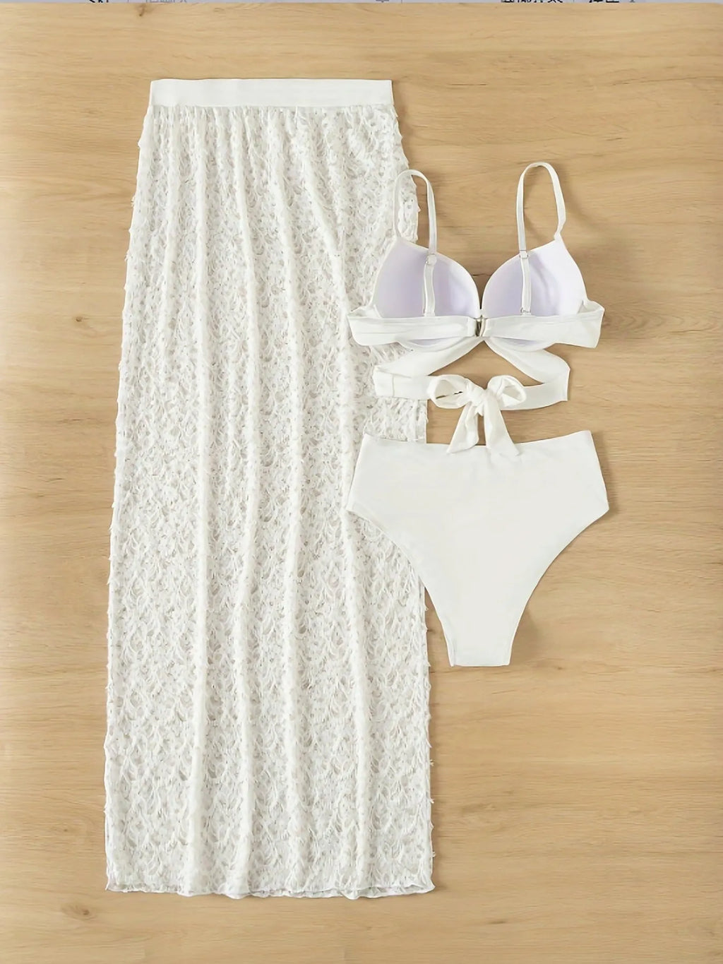 White three-piece swimsuit set with gathered long skirt, sleeveless top and briefs