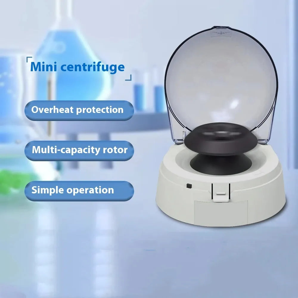 Small white mini centrifuge laboratory equipment on a benchtop