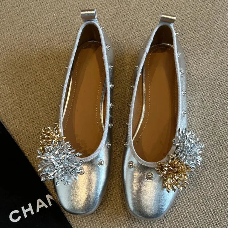 Silver DIY flower rivet Mary Jane shoes with a buckle, showing the round toe and flat rubber sole.