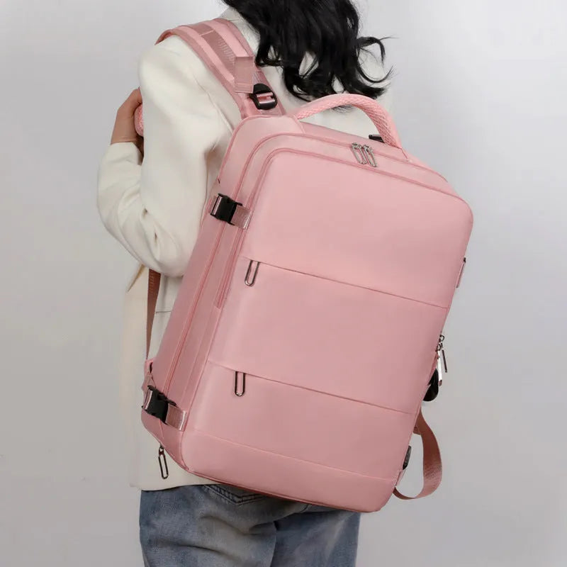Purple women's travel backpack with multiple compartments and air pillow shoulder straps