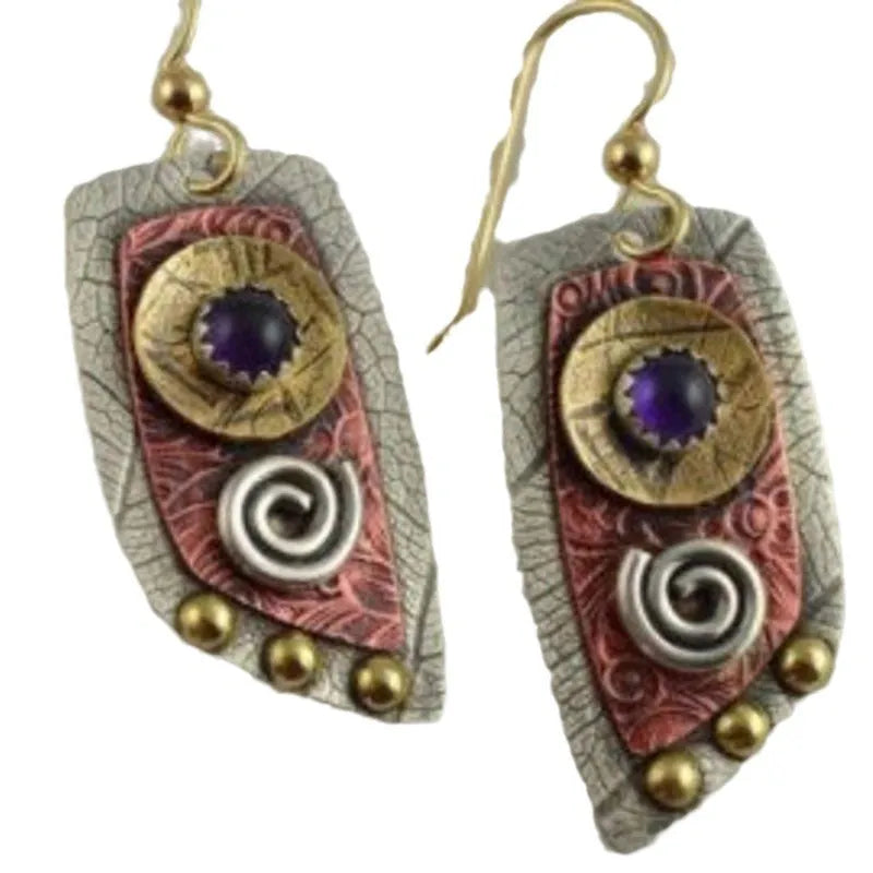 Geometric gold earrings with camouflage leopard print pattern and irregular shape