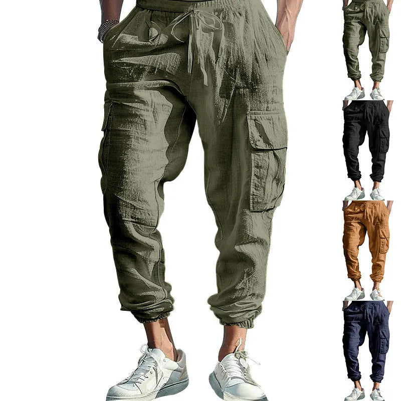 Men's loose-fit linen trousers with ankle ties and a drawstring waist in a solid colour.
