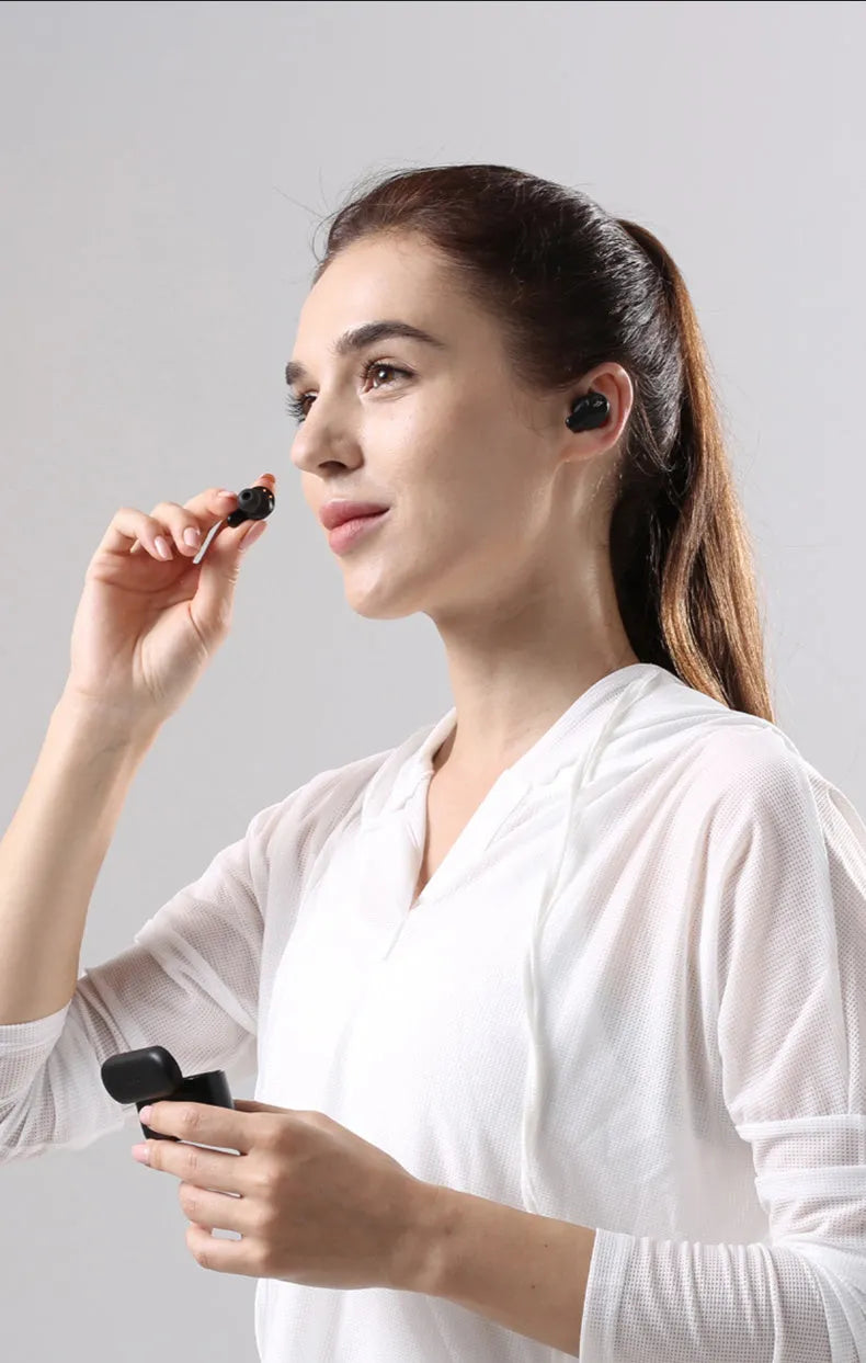 Pearl white true wireless Bluetooth sports headphones with waterproof construction