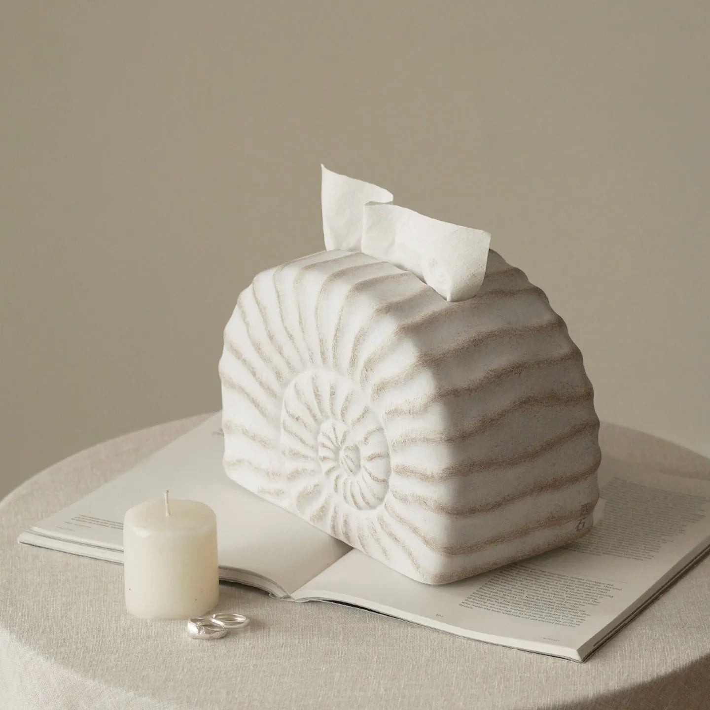 White resin tissue box cover with raised conch shell design
