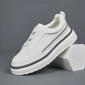 Casual slip-on sneaker in black with elastic band, first layer cowhide upper, foam sole, platform mid heel 3-5cm
