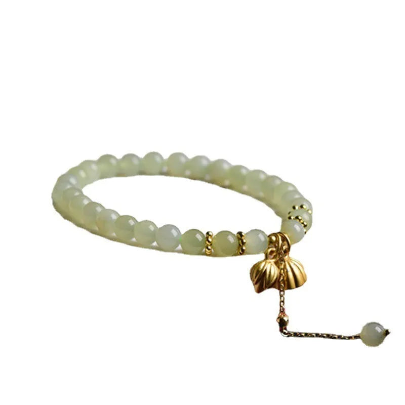 Natural Hetian Jade bracelet with lotus design and sunny water patterns
